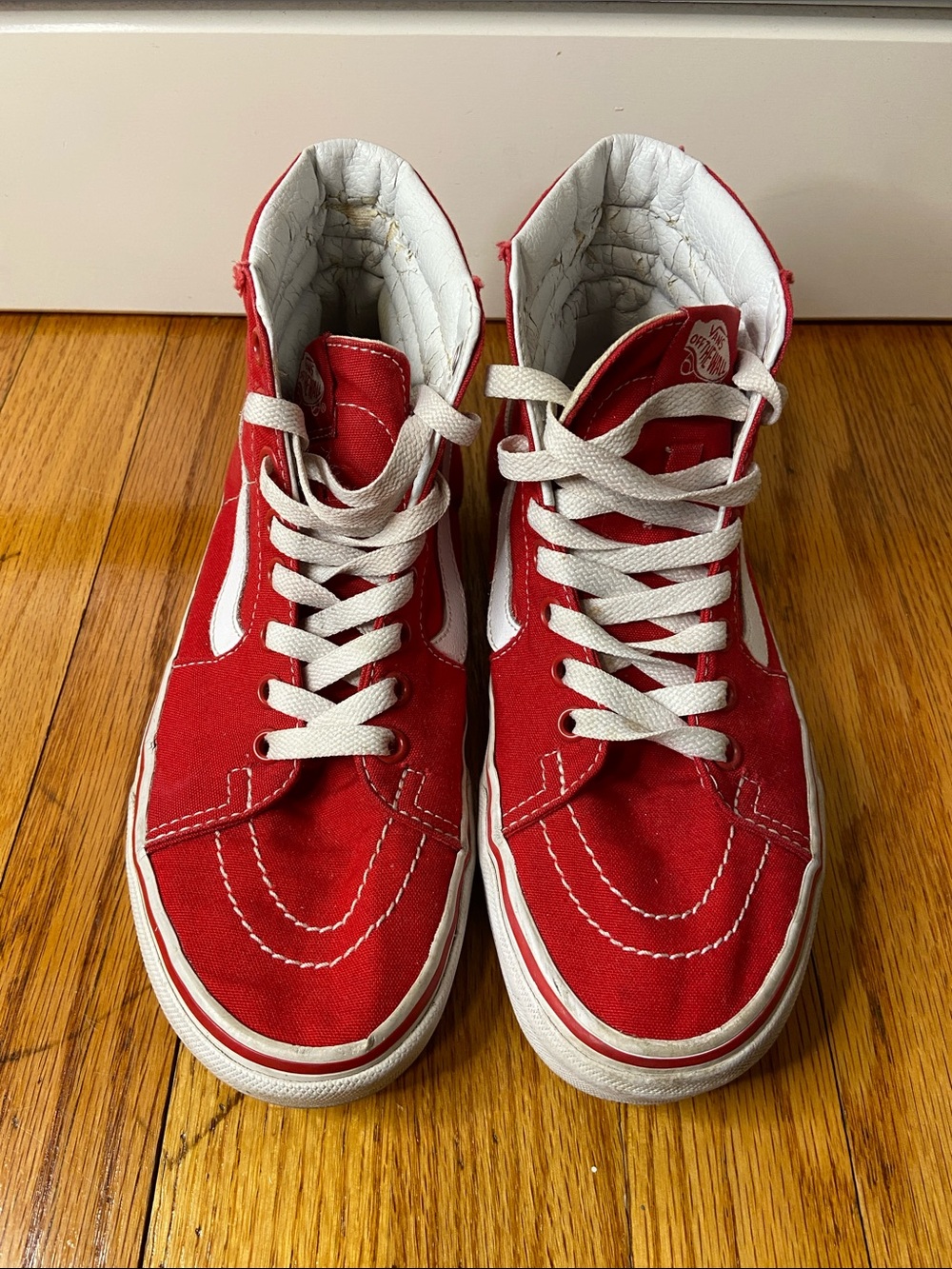Size 7 Women’s Vans Red and White High-Top Sneakers